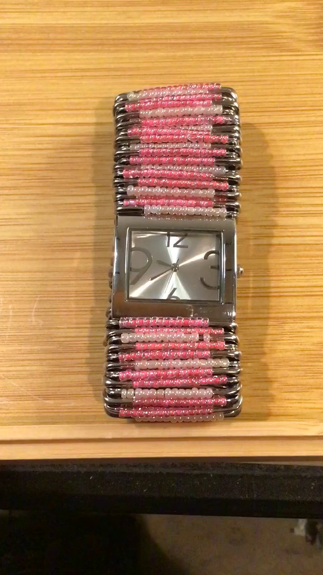 Elixir brand Watch with a beaded safety pin band