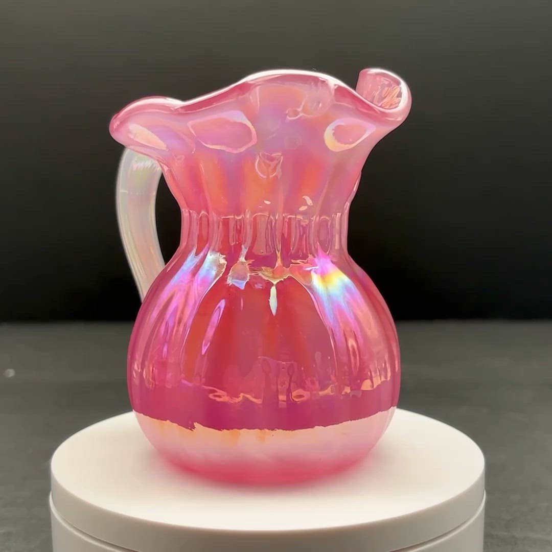 Pink Carnival Glass with Opalescent Handle Miniature Pitcher